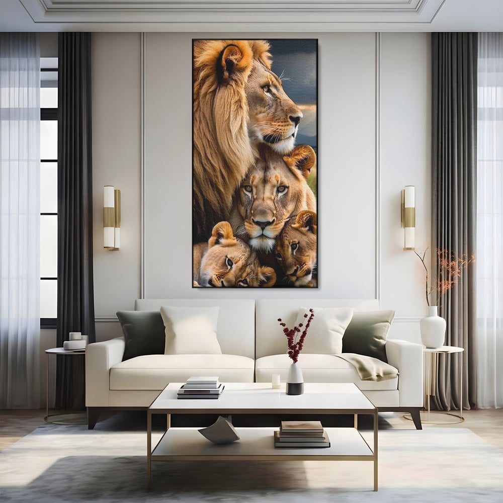 Tablou canvas cu tablou canvas cu o familie de lei, in rama de aluminiu negru, pe perete intr-un living